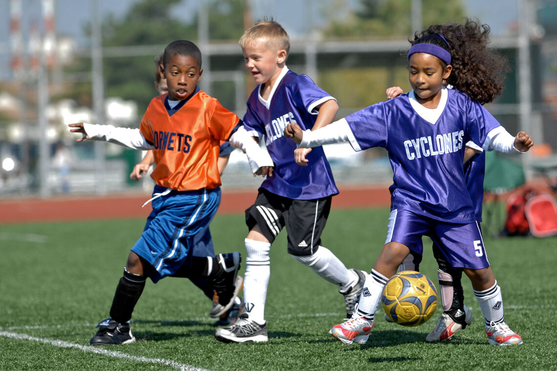 Kids playing soccer