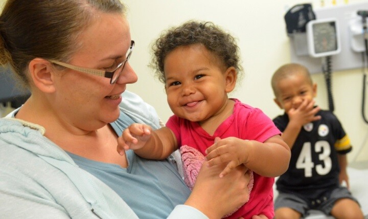 Children in clinic, by Jacob Sippel, Military Health System